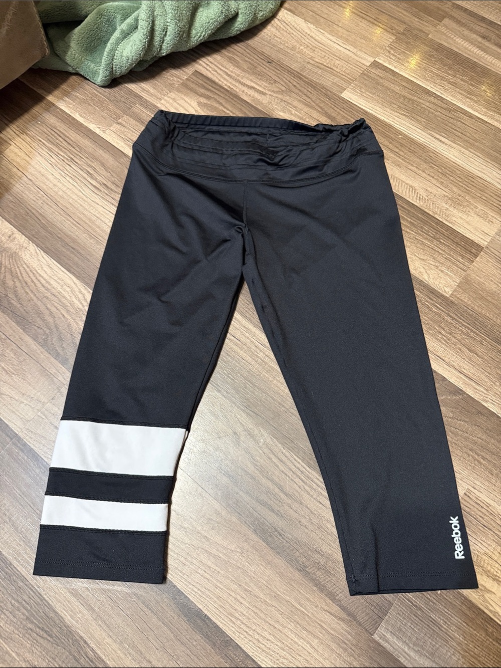 Reebok Black Capri Leggings with White Stripes size medium women’s